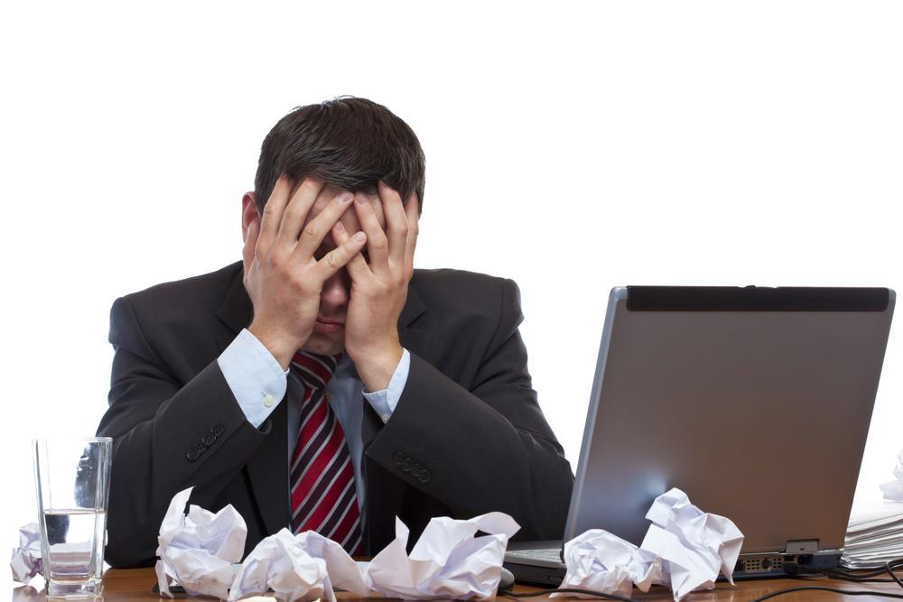 Disorganized frustarted businessman 5 14 12 shutterstock 80904241.JPG